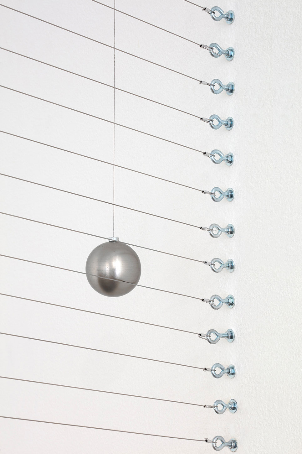 Gradual Shift: close-up of strings and ball